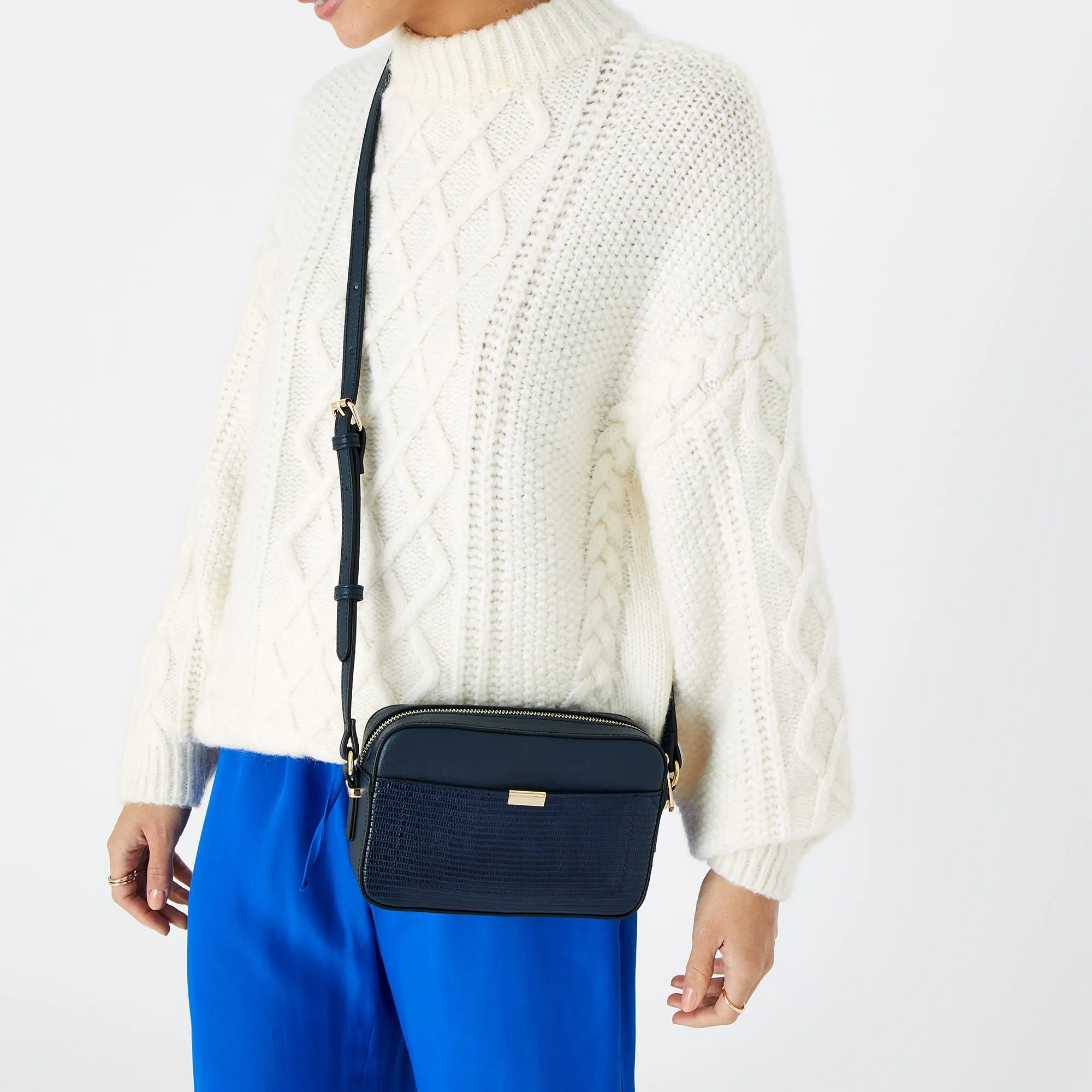 Accessorize London women's Faux Leather Navy Piper Sling bag